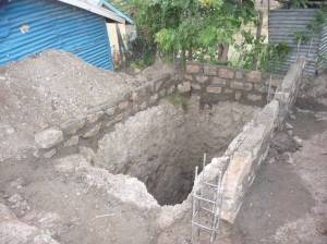 In Africa latrines are hand dug, often to a depth of 40 feet, through sand, gravel and stone.  A long labour-intensive job.