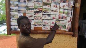 This fellow points to a picture of himself in 2009 working with tourists who were white-water rafting on the Bujagali Falls. He is now unemployed with no income source.